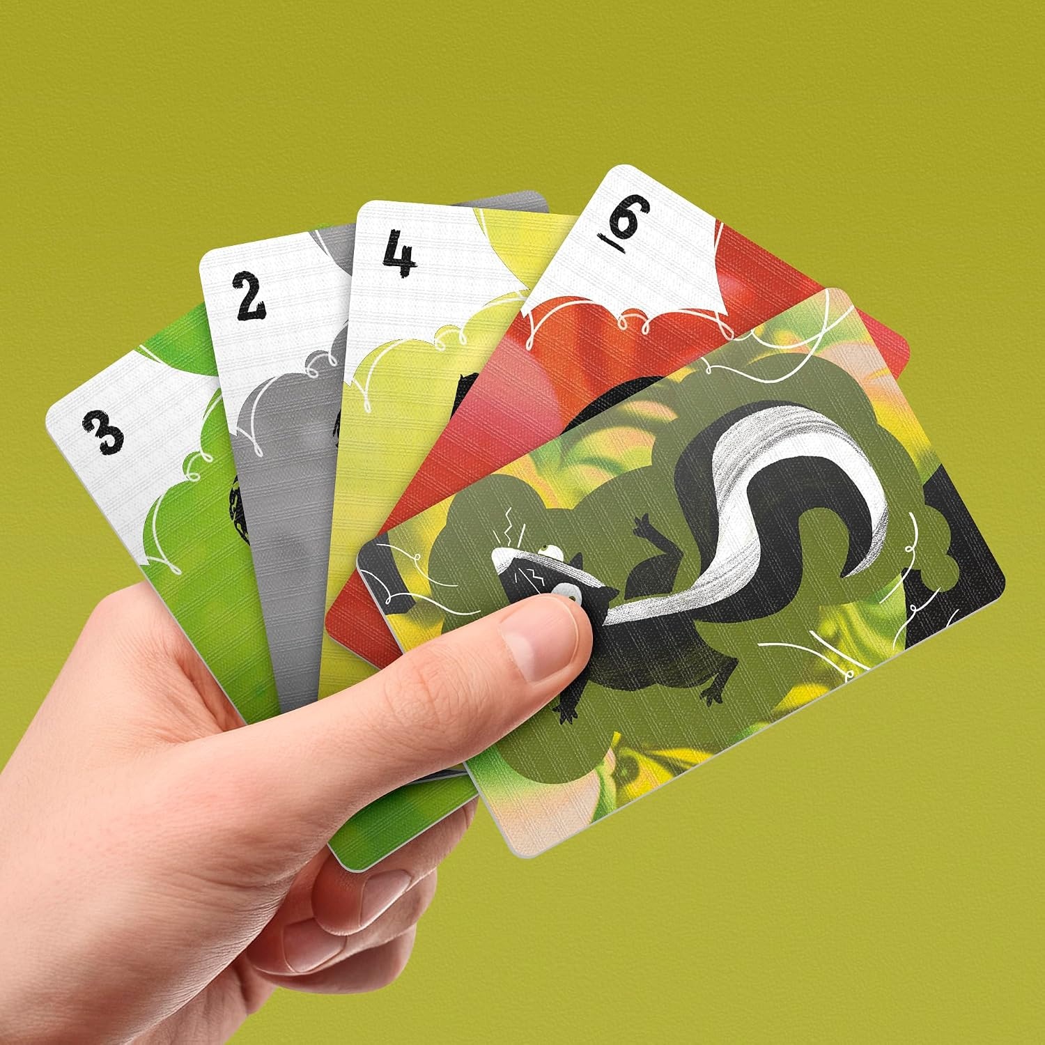 image:imageDump The Skunk Game Family Card Game by Reiner Knizia Ages 7 and Up 26 Players 20 Mins Easy to Learn Games for Kids Teens and Adults