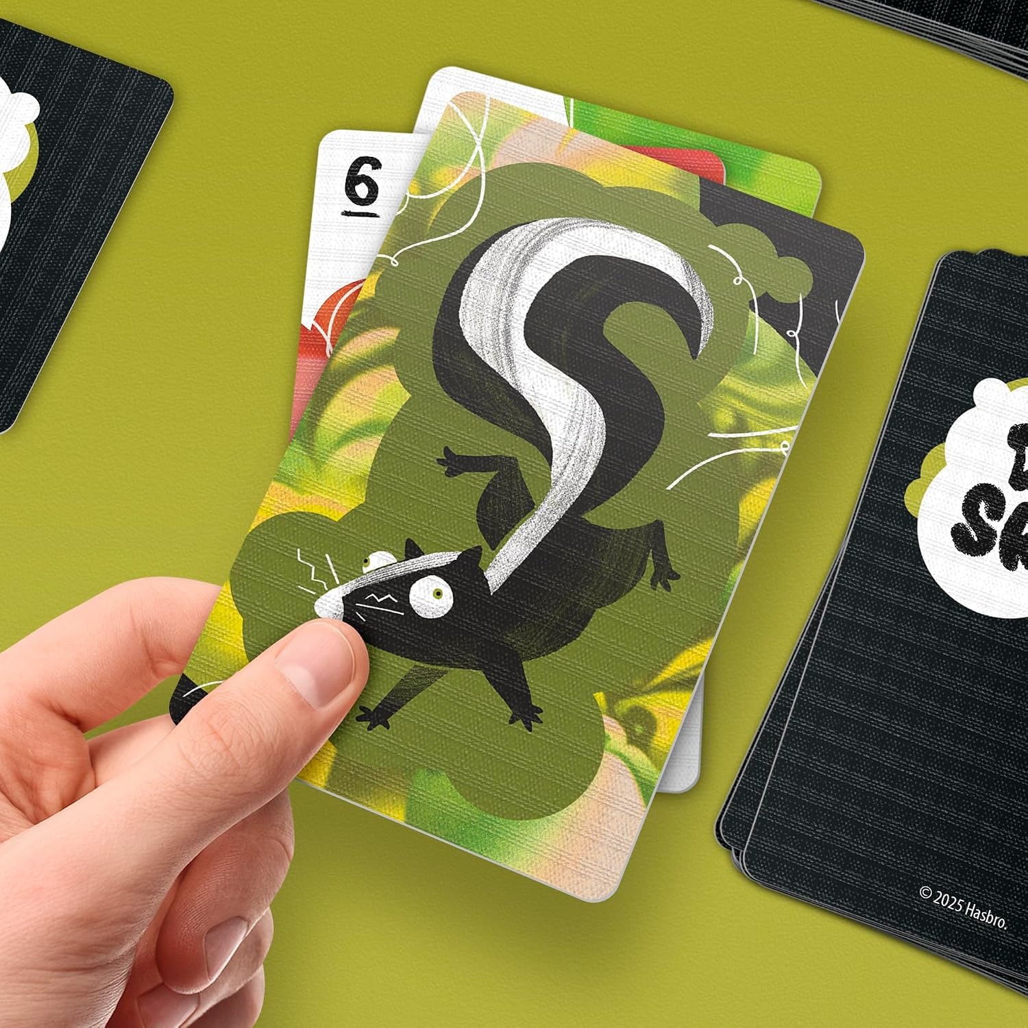 image:imageDump The Skunk Game Family Card Game by Reiner Knizia Ages 7 and Up 26 Players 20 Mins Easy to Learn Games for Kids Teens and Adults