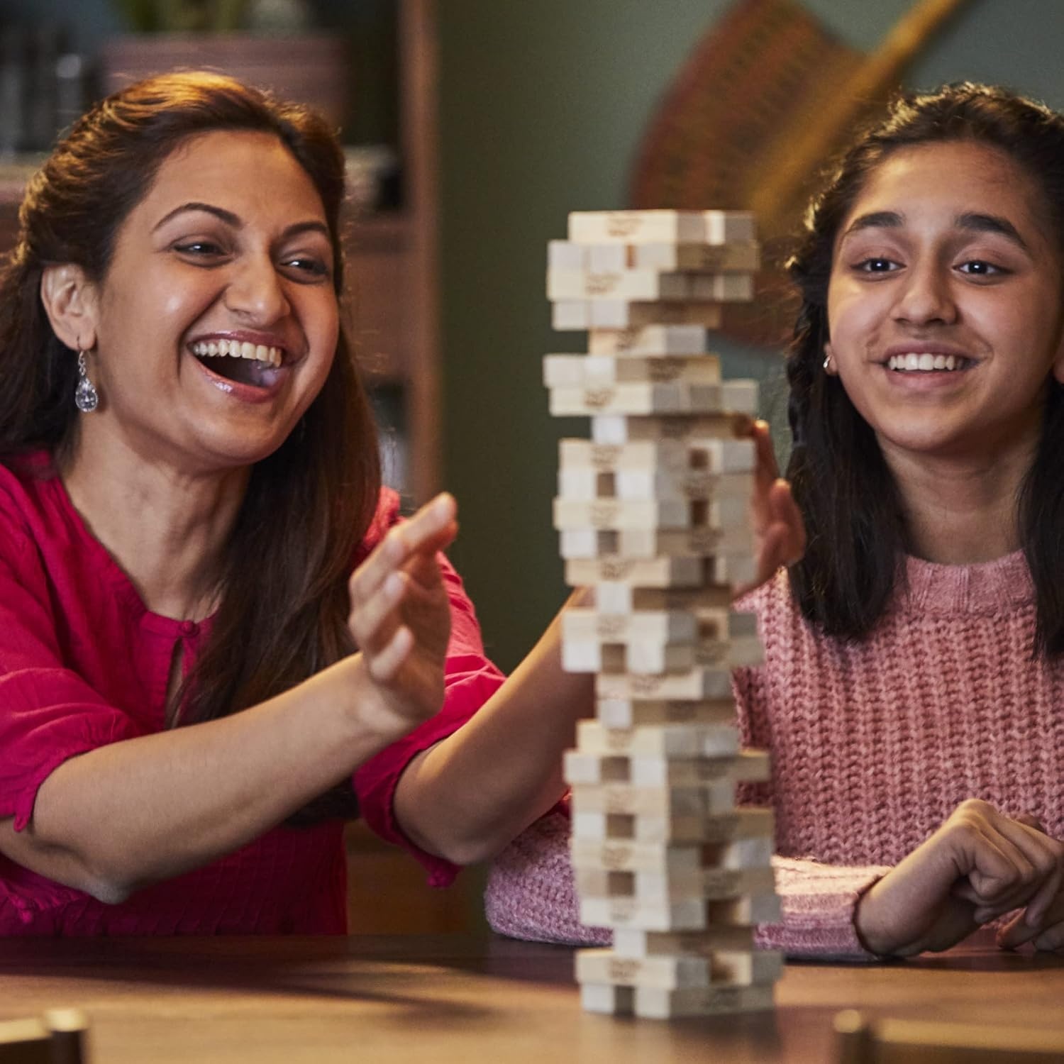 image:imageHasbro Gaming Jenga Game The Original Wood Block Game with Genuine Hardwood Blocks Stacking Tower Ages 6 1 or More Players Party Games for Kids Family GamesClassic