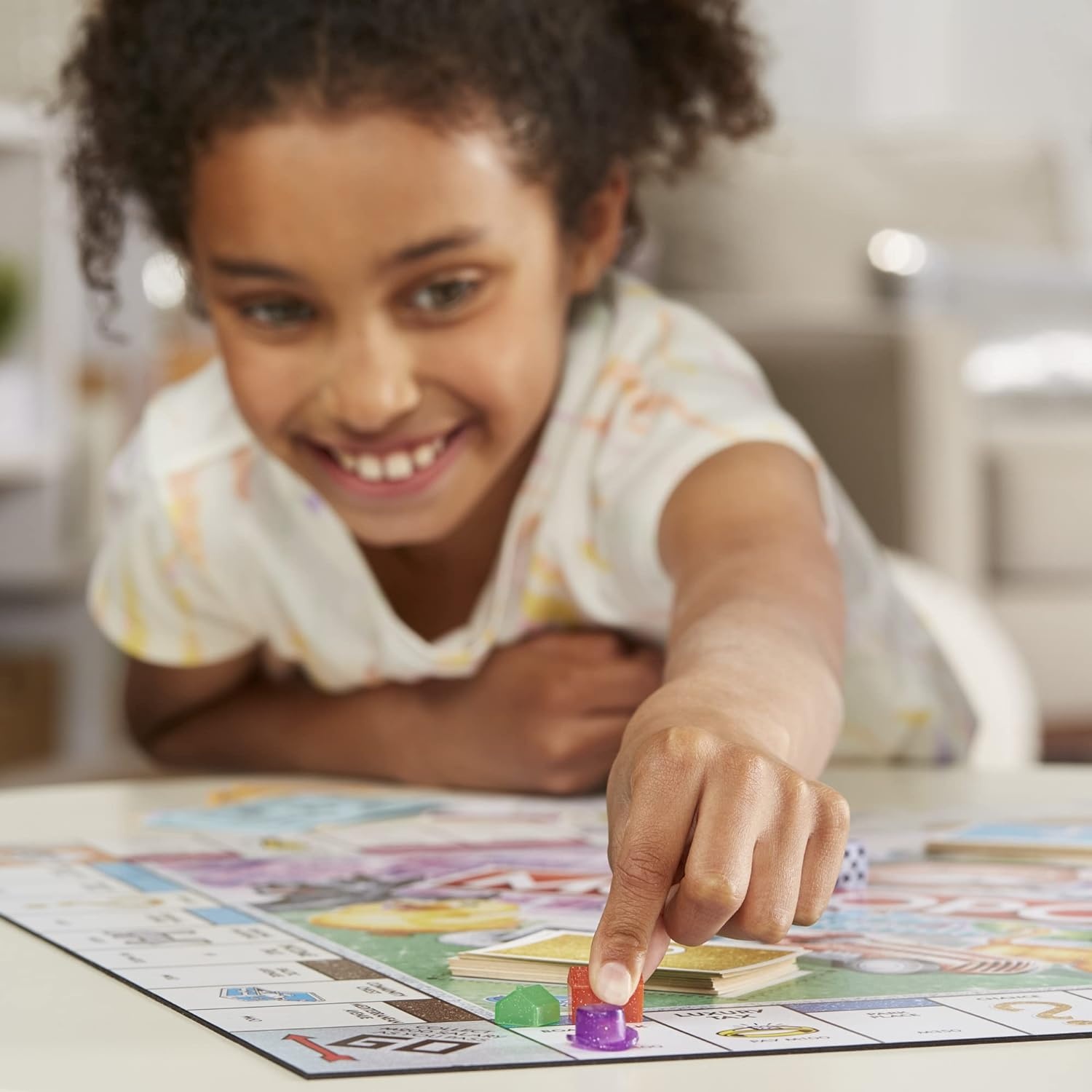 image:imageHasbro Gaming Monopoly Sparkle Edition Board Game Family Games with Glittery Tokens Pearlescent Dice Sparkly Look Amazon Exclusive