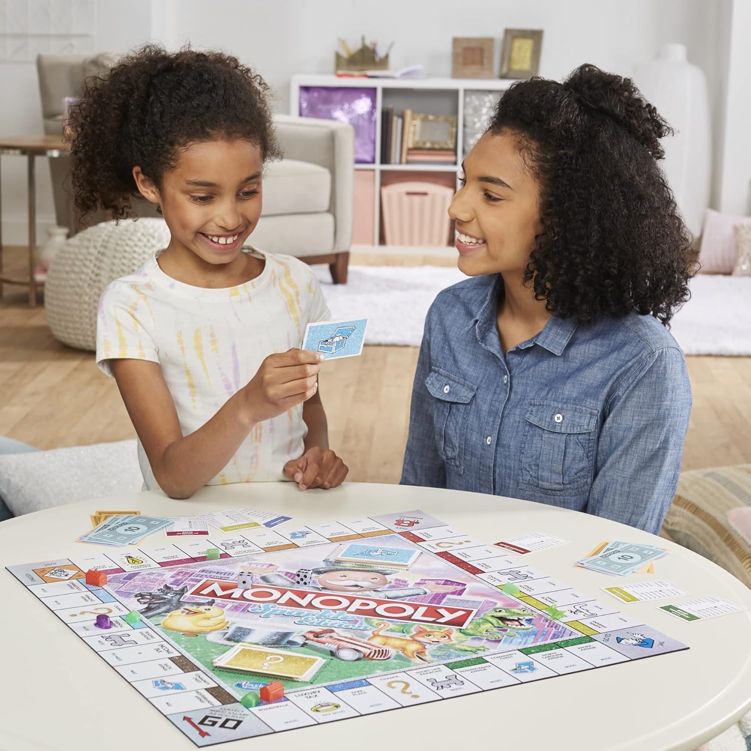 image:imageHasbro Gaming Monopoly Sparkle Edition Board Game Family Games with Glittery Tokens Pearlescent Dice Sparkly Look Amazon Exclusive