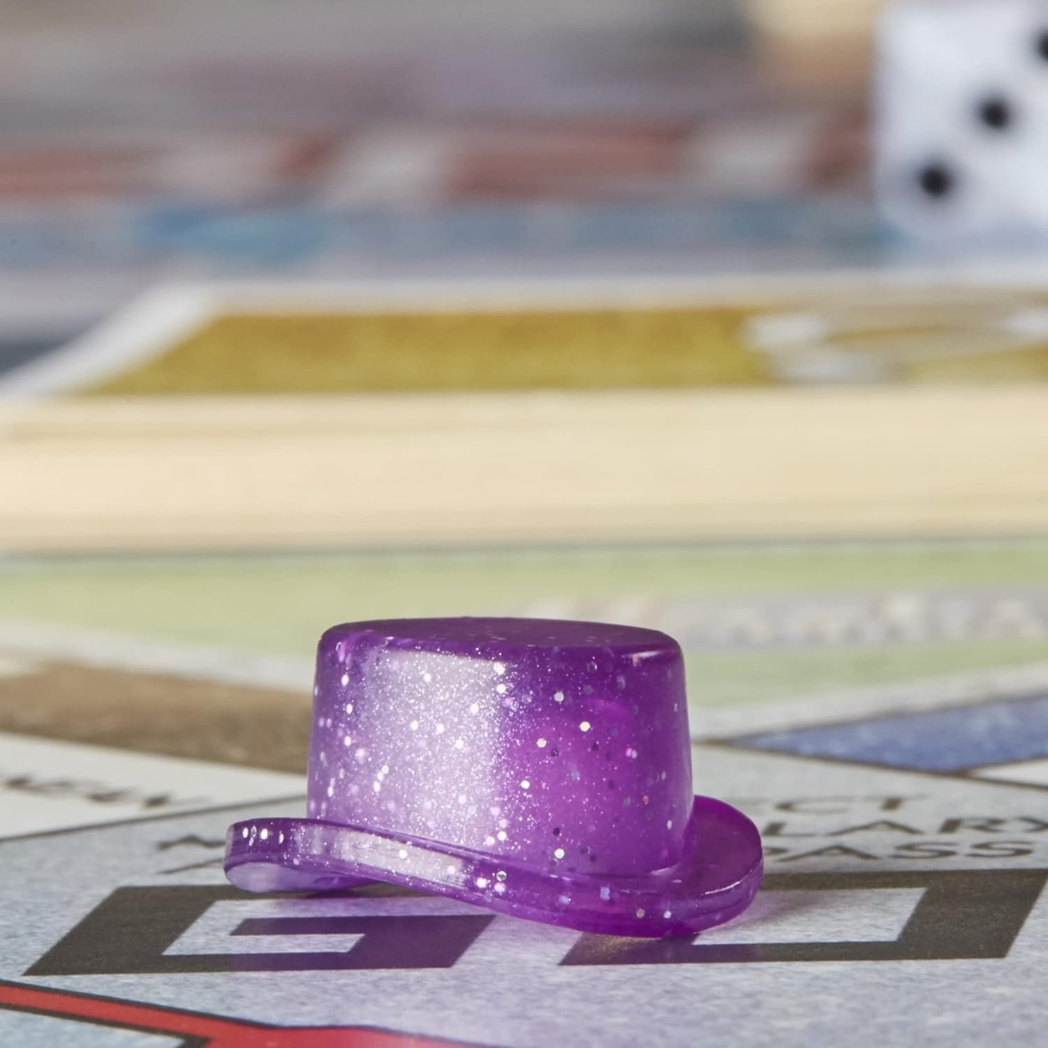 image:imageHasbro Gaming Monopoly Sparkle Edition Board Game Family Games with Glittery Tokens Pearlescent Dice Sparkly Look Amazon Exclusive