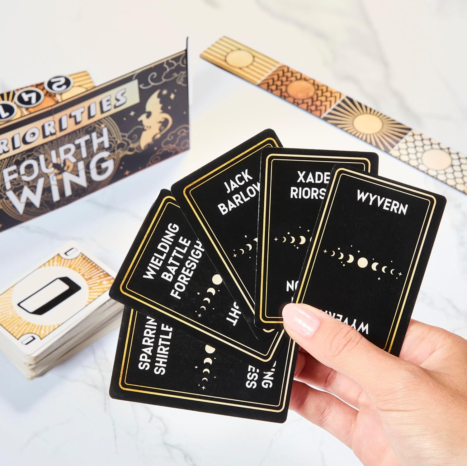 image:imageHasbro Gaming Priorities Fourth Wing Edition Game Officially Licensed Party Game Inspired by Empyrean Series Ages 17 3 Players 20 Mins