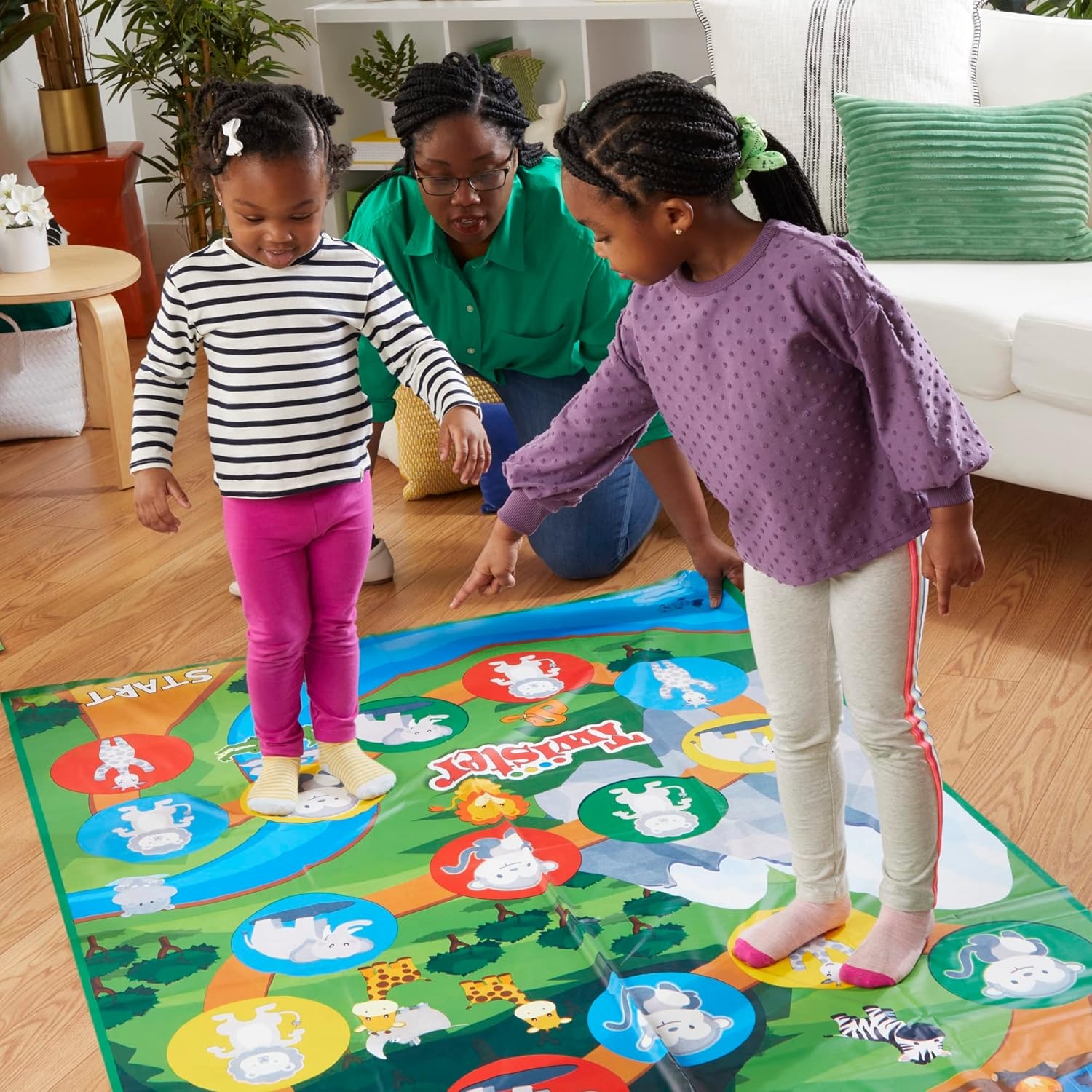 image:imageHasbro Gaming Twister Junior Game Animal Adventure 2Sided Mat 2 Games in 1 Party Game for Kids Ages 3 and Up and 24 Players Amazon Exclusive