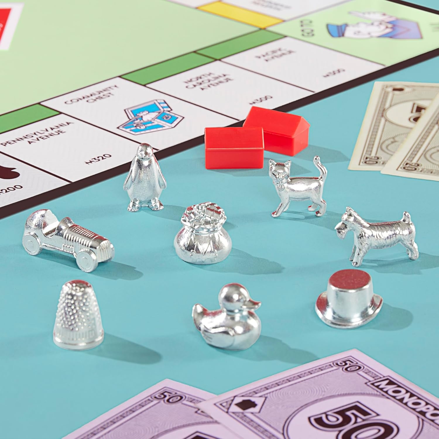 image:imageMonopoly Board Game Classic Game with Storage Tray and Larger Tokens Ages 8 2 to 6 Players Family Games for Kids and Adults Kids GiftsMonopoly