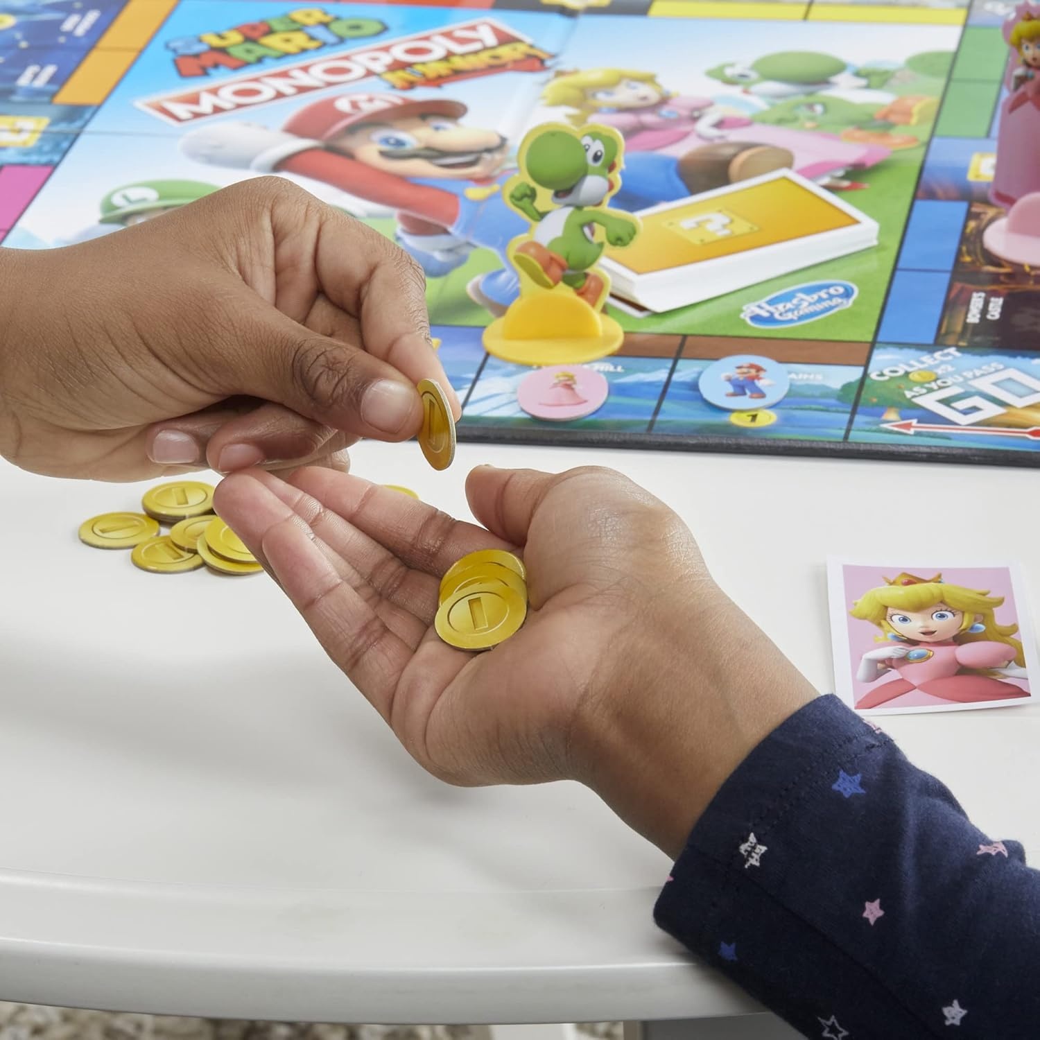 image:imageMonopoly Junior Super Mario Edition Board Game Fun Kids Ages 5 and Up Explore The Mushroom Kingdom as Mario Peach Yoshi or Luigi Amazon Exclusive