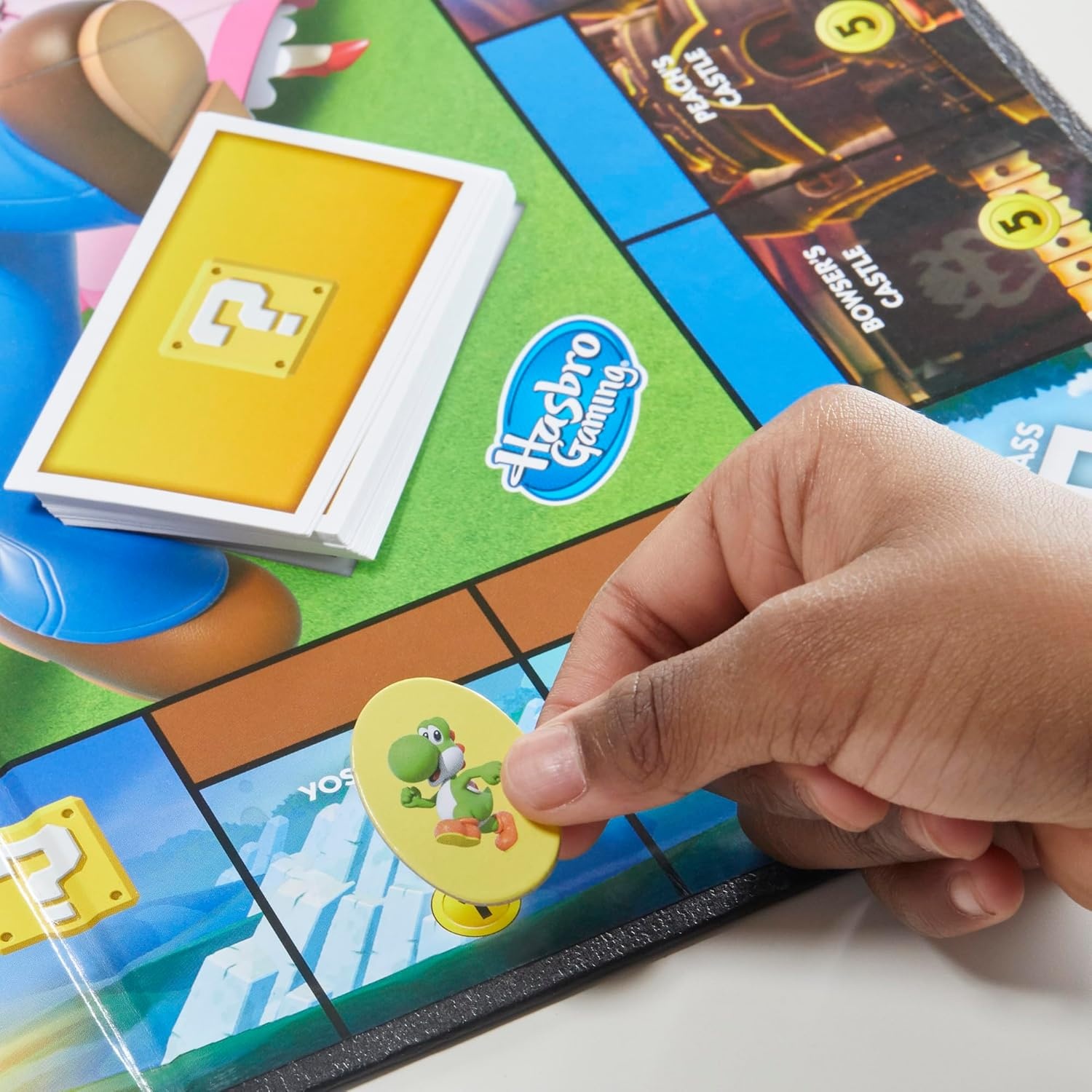 image:imageMonopoly Junior Super Mario Edition Board Game Fun Kids Ages 5 and Up Explore The Mushroom Kingdom as Mario Peach Yoshi or Luigi Amazon Exclusive